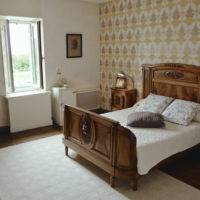 Lit en bois location Chambre de la Meunière